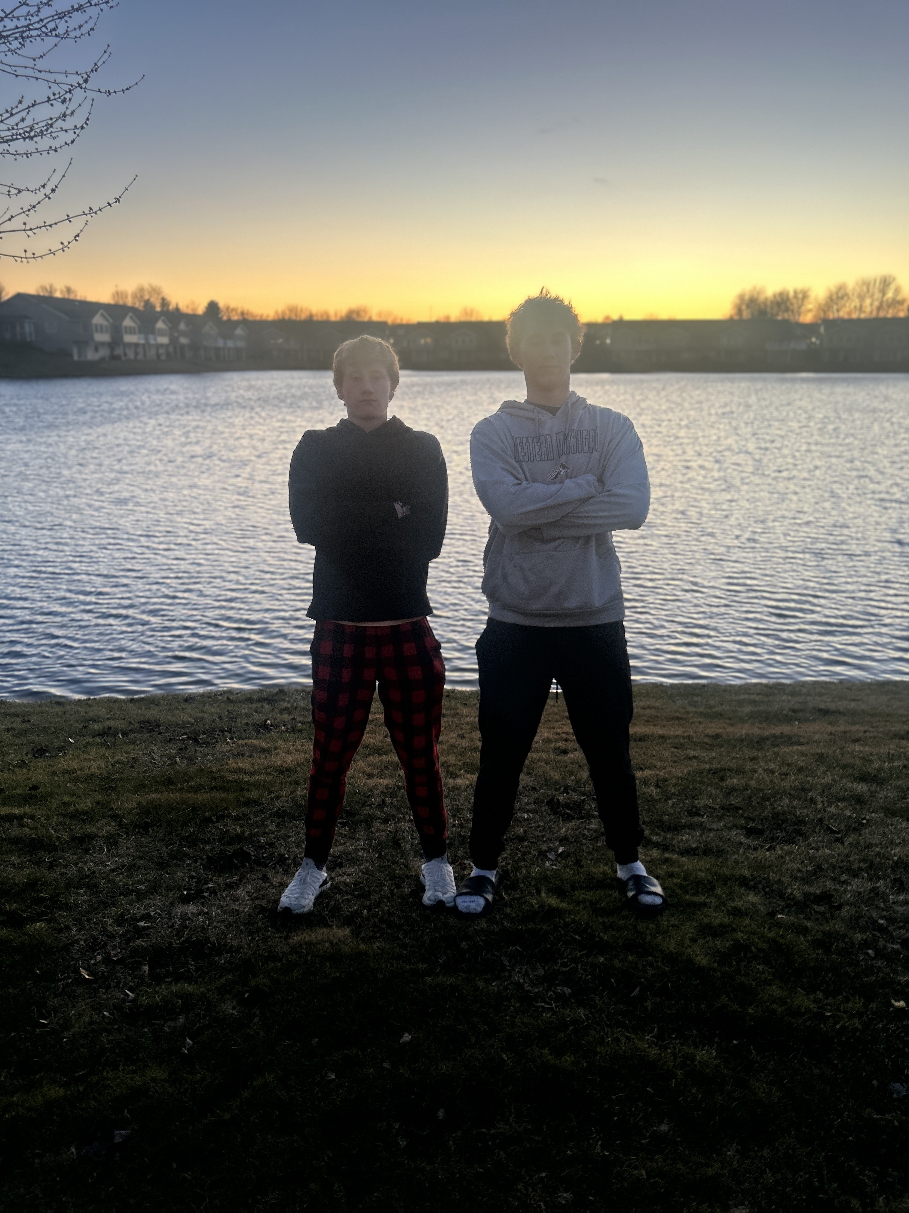 Lures with various colors and hooks on a white background. There could be a tackle box in the top left of the image.